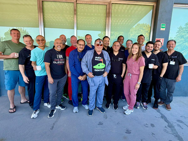 Group of dentists and staff at the implant course